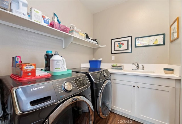 27843 Huron Ct, Menifee, CA 92585 - laundry room with washer and dryer, wood finished floors, and cabinet space