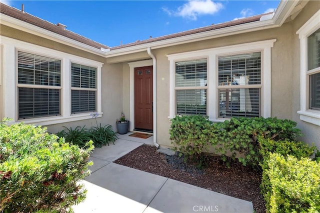 27843 Huron Ct, Menifee, CA 92585 - view of exterior entry with stucco siding