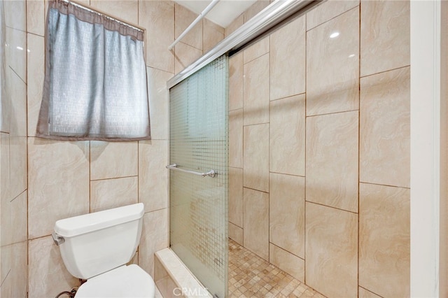 5320 Zelzah Ave Unit 106, Encino, CA 91316 - bathroom featuring a shower stall and tile walls