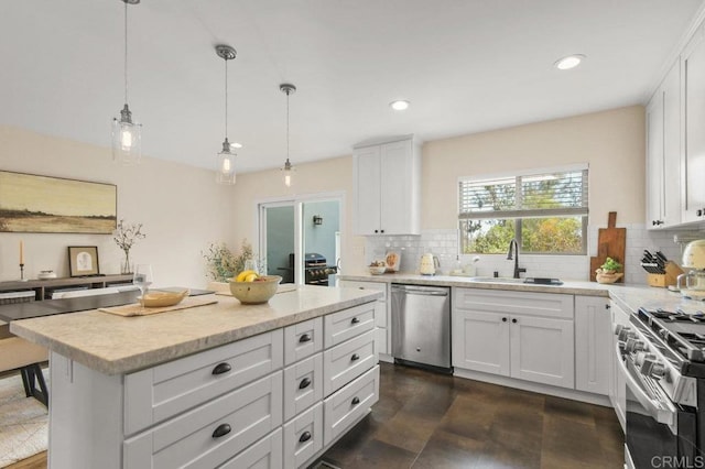 3585 Redwood St, San Diego, CA 92104 - kitchen with appliances with stainless steel finishes, tasteful backsplash, recessed lighting, white cabinetry, and a kitchen island