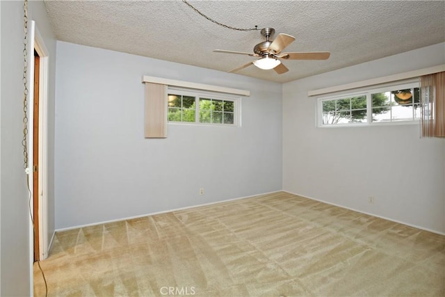13924 2nd St, Whittier, CA 90605 - unfurnished room featuring healthy amount of natural light, carpet floors, a ceiling fan, and a textured ceiling