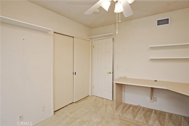 13924 2nd St, Whittier, CA 90605 - unfurnished office featuring ceiling fan, light colored carpet, and a textured ceiling
