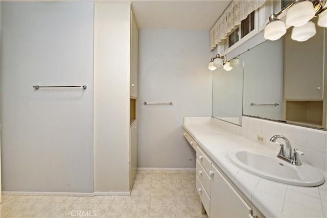 13924 2nd St, Whittier, CA 90605 - bathroom with vanity and baseboards