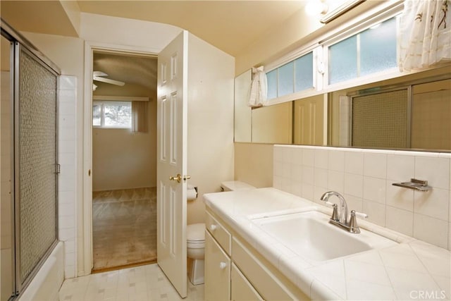 13924 2nd St, Whittier, CA 90605 - full bathroom featuring vanity, lofted ceiling, decorative backsplash, and combined bath / shower with glass door
