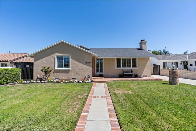 15037 Hiawatha St, Mission Hills San Fernando, CA 91345 - view of front facade featuring stucco siding and a chimney