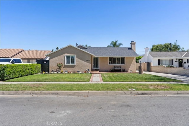 15037 Hiawatha St, Mission Hills San Fernando, CA 91345 - ranch-style house with stucco siding, concrete driveway, a gate, and a chimney