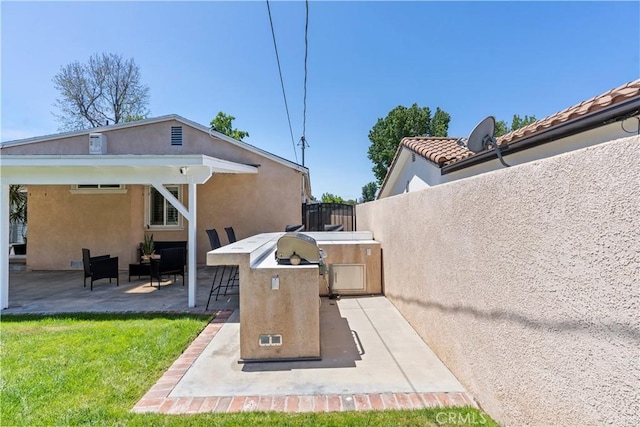 15037 Hiawatha St, Mission Hills San Fernando, CA 91345 - view of patio with an outdoor kitchen