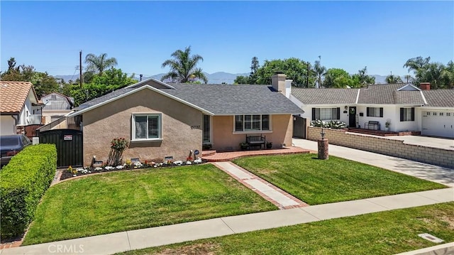 15037 Hiawatha St, Mission Hills San Fernando, CA 91345 - single story home featuring a garage, concrete driveway, stucco siding, and a chimney