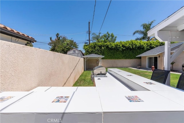 15037 Hiawatha St, Mission Hills San Fernando, CA 91345 - fenced backyard featuring a patio area