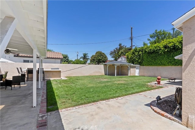15037 Hiawatha St, Mission Hills San Fernando, CA 91345 - fenced backyard with a patio area and an outdoor structure