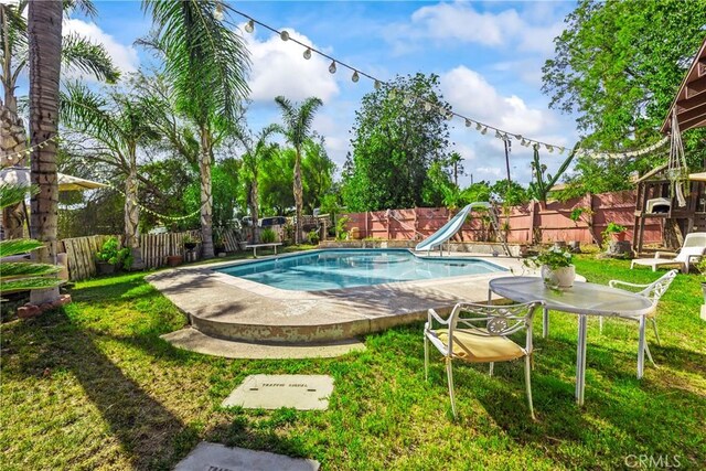 822 Corona Ave, Corona, CA 92879 - view of pool featuring a water slide and a fenced backyard