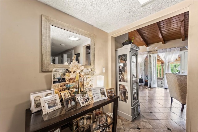 822 Corona Ave, Corona, CA 92879 - corridor with a textured ceiling, tile patterned floors, and wooden ceiling