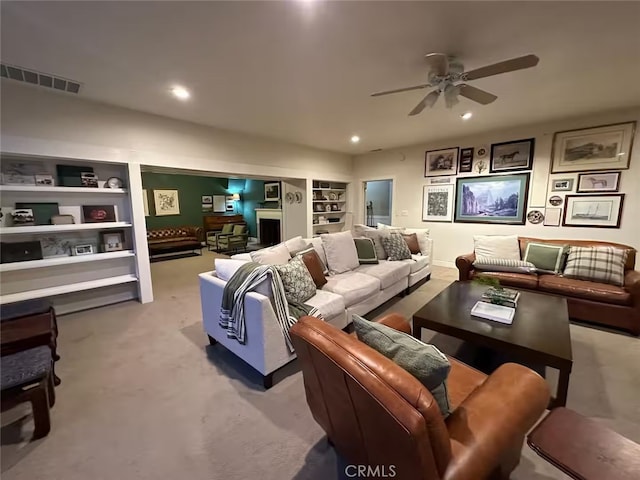 24145 Tokayana Way, Colfax, CA 95713 - living room with a ceiling fan, built in features, recessed lighting, and carpet flooring