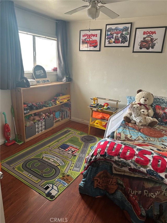11222 Pinon Ave, Hesperia, CA 92345 - bedroom with wood finished floors and ceiling fan