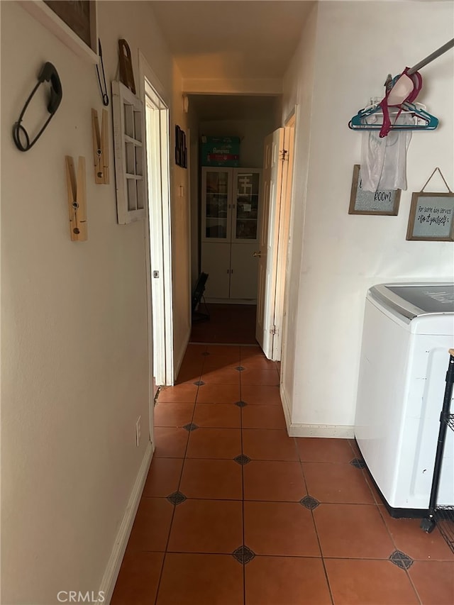 11222 Pinon Ave, Hesperia, CA 92345 - hall with tile patterned floors and washer / clothes dryer