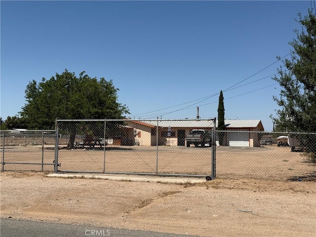 11222 Pinon Ave, Hesperia, CA 92345 - view of front of house featuring a carport