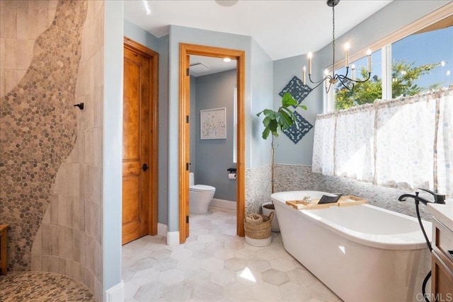 29861 Kirsten Ln, Vista, CA 92084 - bathroom featuring a soaking tub, tiled shower, a chandelier, and tile patterned floors
