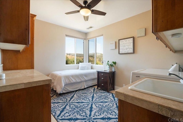 29861 Kirsten Ln, Vista, CA 92084 - bedroom featuring independent washer and dryer and ceiling fan
