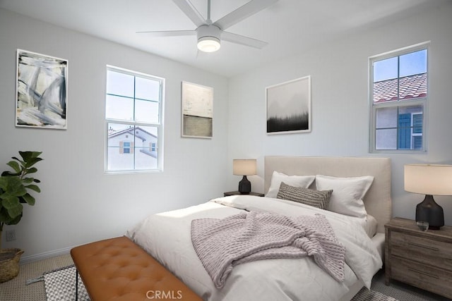 26370 Piazza Di Sarro, Newhall, CA 91321 - carpeted bedroom featuring multiple windows and a ceiling fan