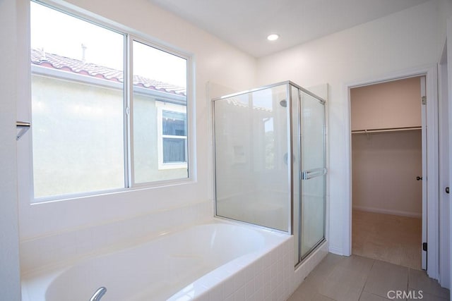 26370 Piazza Di Sarro, Newhall, CA 91321 - bathroom with a stall shower, a garden tub, plenty of natural light, a walk in closet, and recessed lighting