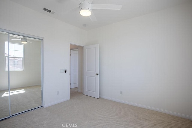 26370 Piazza Di Sarro, Newhall, CA 91321 - unfurnished bedroom with light carpet, a closet, and a ceiling fan