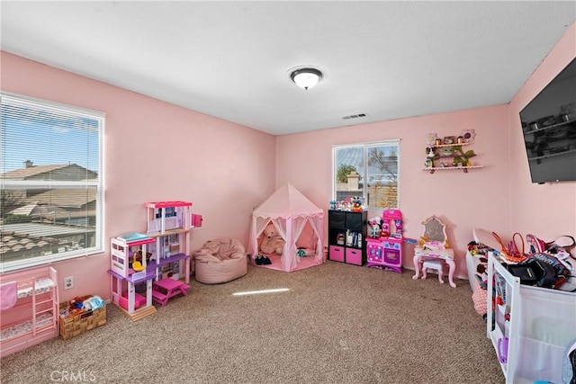 3260 Ivy Ct, Perris, CA 92571 - playroom featuring plenty of natural light and carpet floors