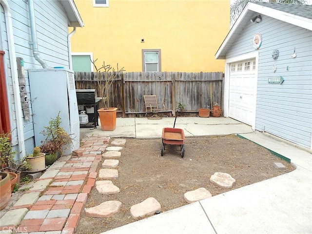 2616 S Denison Ave, San Pedro, CA 90731 - view of yard with a garage and a patio