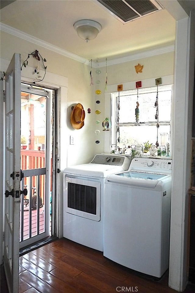 2616 S Denison Ave, San Pedro, CA 90731 - laundry room featuring ornamental molding, washing machine and dryer, and dark wood-type flooring