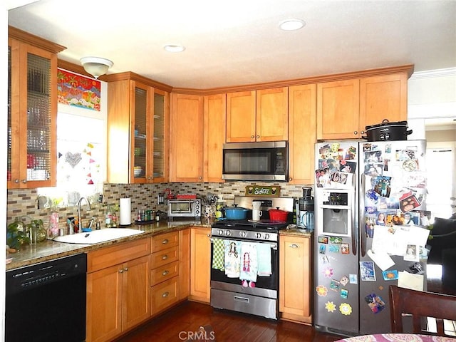2616 S Denison Ave, San Pedro, CA 90731 - kitchen with stainless steel appliances, backsplash, glass insert cabinets, stone counters, and recessed lighting