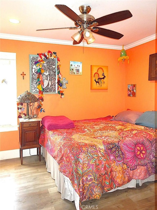 2616 S Denison Ave, San Pedro, CA 90731 - bedroom with light wood-style floors, ornamental molding, and a ceiling fan