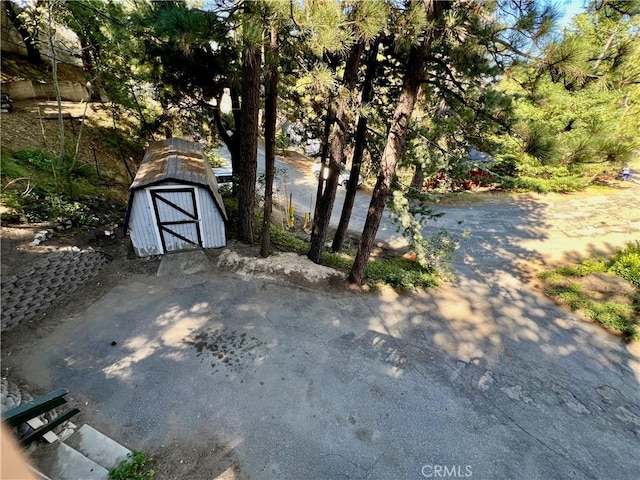 31016 Summit Dr, Running Springs, CA 92382 - view of patio with a shed