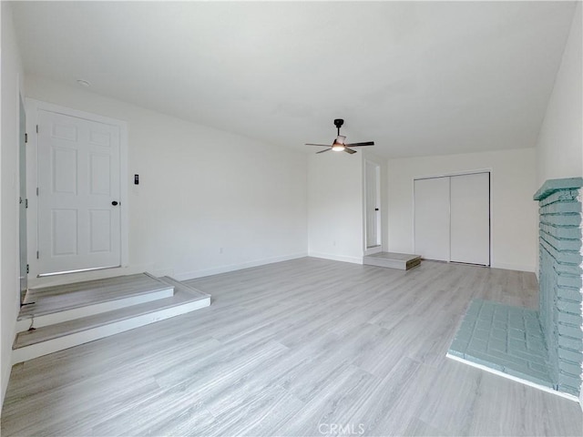 1512 S Butler Ave, Compton, CA 90221 - unfurnished living room featuring a ceiling fan and wood finished floors