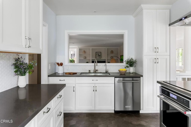 413 Sycamore Pl, Sierra Madre, CA 91024 - kitchen featuring oven, wall chimney range hood, dark countertops, and backsplash
