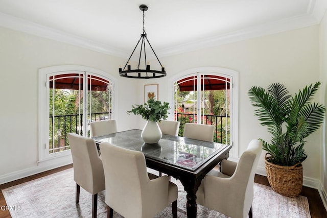 413 Sycamore Pl, Sierra Madre, CA 91024 - dining space featuring ornamental molding, wood finished floors, and a chandelier
