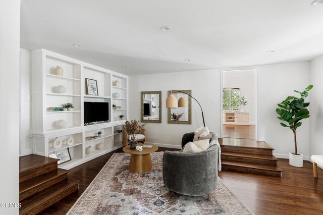 413 Sycamore Pl, Sierra Madre, CA 91024 - living area featuring stairway, dark wood-type flooring, built in features, and recessed lighting