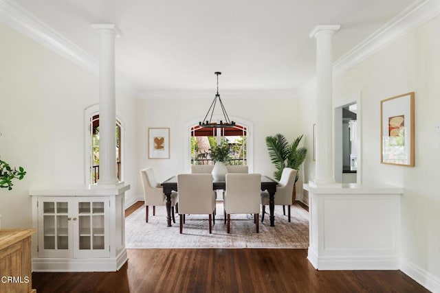 413 Sycamore Pl, Sierra Madre, CA 91024 - dining area with crown molding, decorative columns, and dark wood finished floors