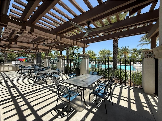 27265 Graphite Dr, Menifee, CA 92584 - view of patio featuring a pergola, exterior kitchen, and outdoor dining space
