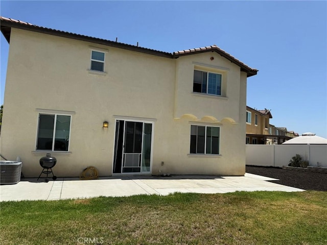 27265 Graphite Dr, Menifee, CA 92584 - back of property with a patio area, stucco siding, and a tiled roof