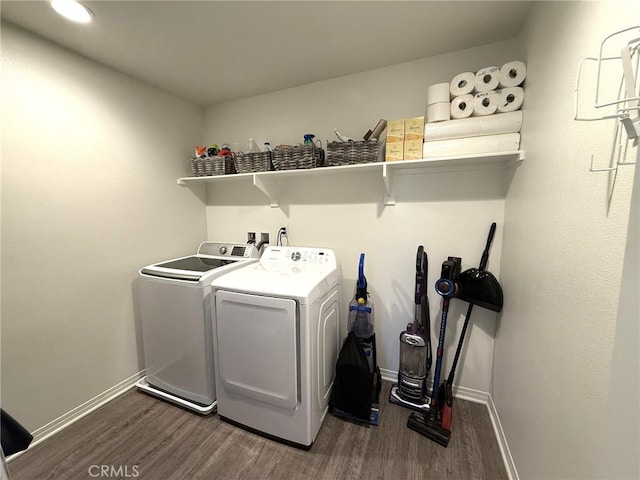 27265 Graphite Dr, Menifee, CA 92584 - washroom with washer and dryer and dark wood finished floors