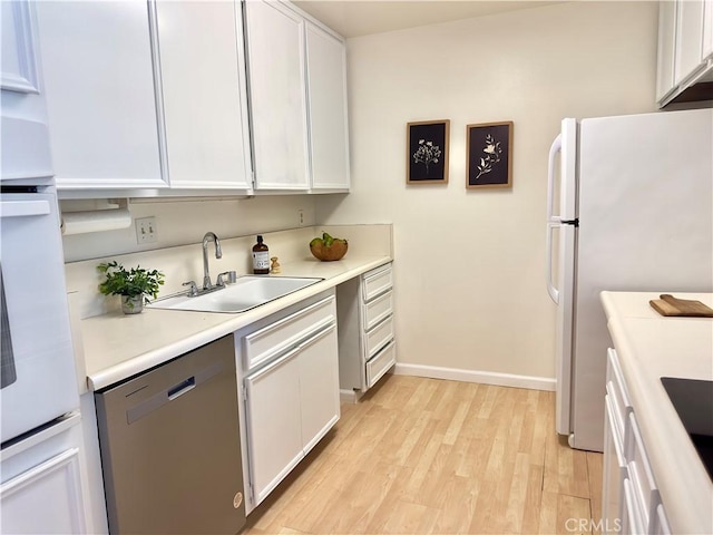 570 Peach St Unit 25, San Luis Obispo, CA 93401 - kitchen featuring dishwasher, freestanding refrigerator, refrigerator, light wood finished floors, and white cabinets