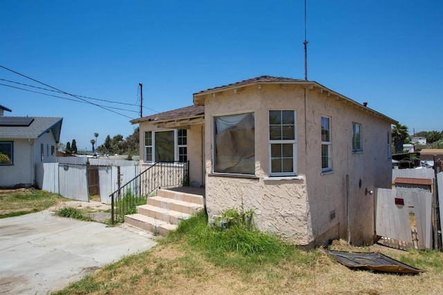 5412 Cervantes Ave, San Diego, CA 92114 - bungalow-style home featuring stucco siding and a patio area