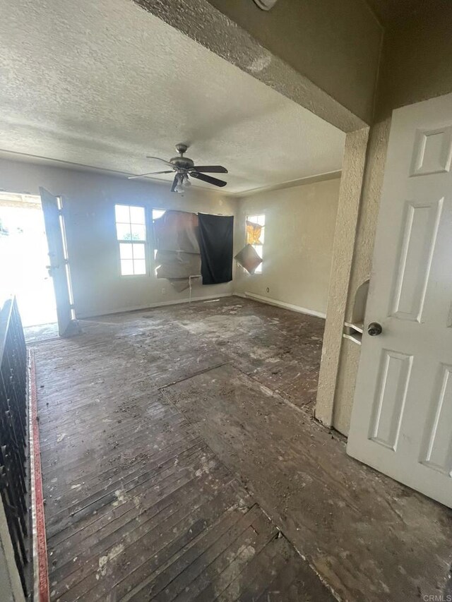 5412 Cervantes Ave, San Diego, CA 92114 - unfurnished living room with a textured ceiling and ceiling fan