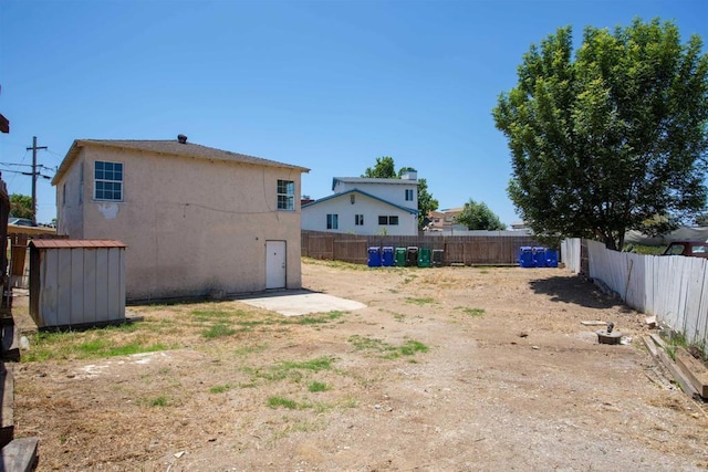 5412 Cervantes Ave, San Diego, CA 92114 - fenced backyard featuring a storage unit