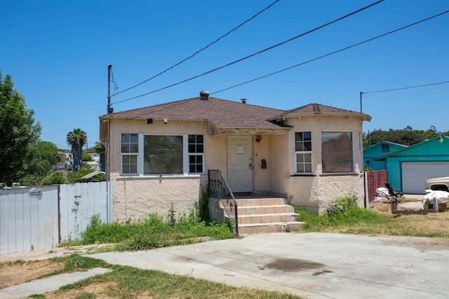 5412 Cervantes Ave, San Diego, CA 92114 - bungalow-style home with stucco siding and roof with shingles