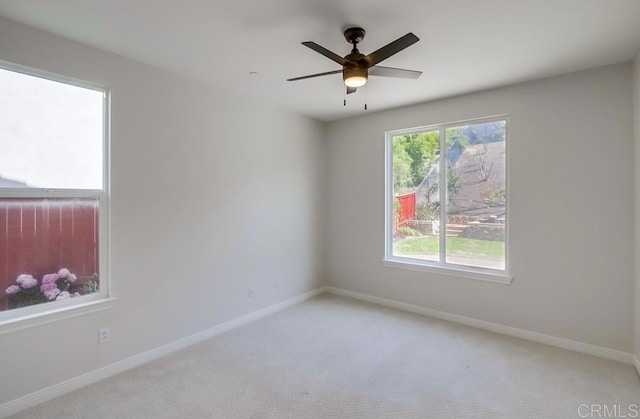 15240 Cayenne Creek Ct, San Diego, CA 92127 - empty room with light carpet and a ceiling fan
