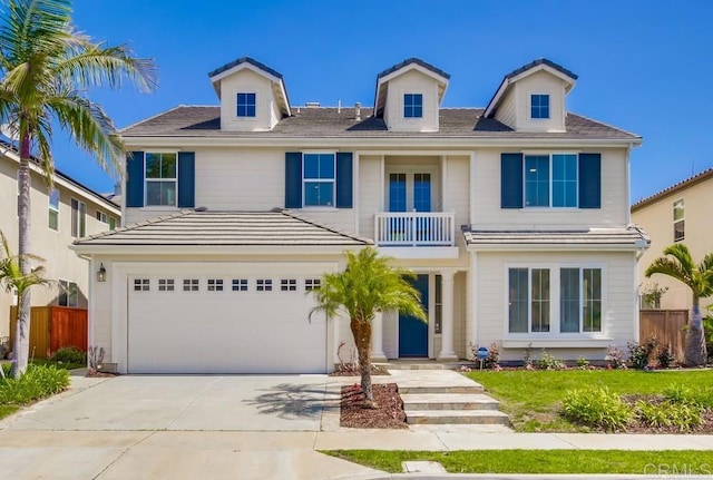 15240 Cayenne Creek Ct, San Diego, CA 92127 - view of front facade with a balcony, a garage, and driveway