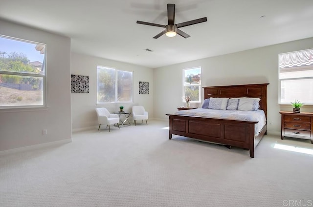 15240 Cayenne Creek Ct, San Diego, CA 92127 - bedroom with multiple windows, light colored carpet, and ceiling fan