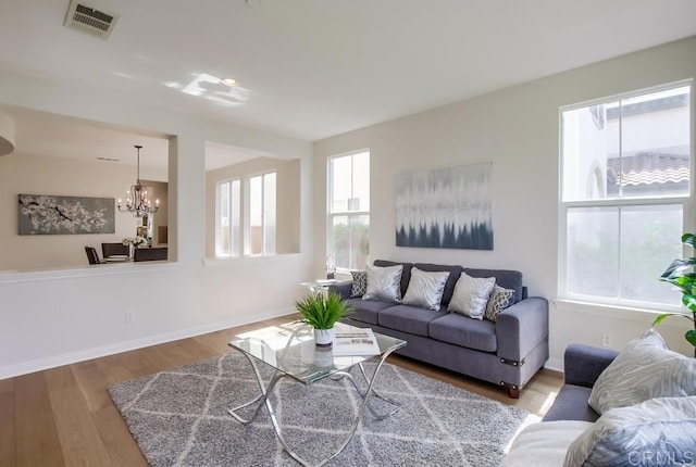 15240 Cayenne Creek Ct, San Diego, CA 92127 - living area with a chandelier and wood finished floors