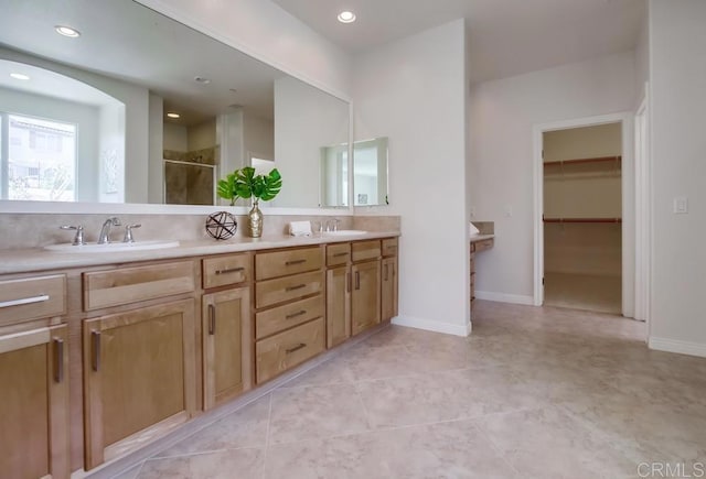 15240 Cayenne Creek Ct, San Diego, CA 92127 - bathroom featuring a stall shower, double vanity, a walk in closet, and recessed lighting