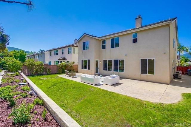15240 Cayenne Creek Ct, San Diego, CA 92127 - back of property with outdoor lounge area, a chimney, a patio area, and stucco siding